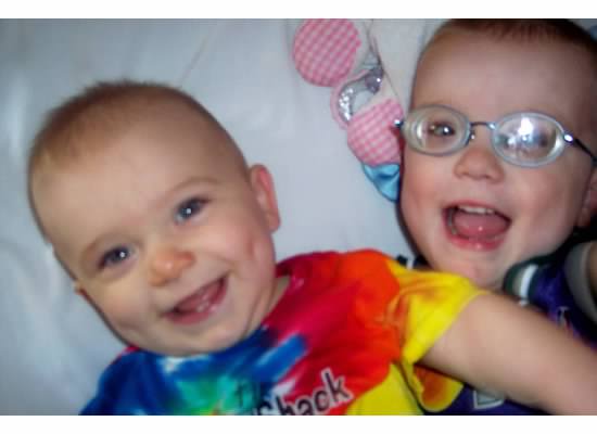 The boys hanging in T.Puzzle's crib.  Hard to believe they both used to fit!
