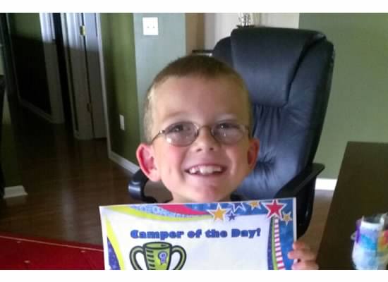 Full Speed shows off his Camper of the Day certificate.